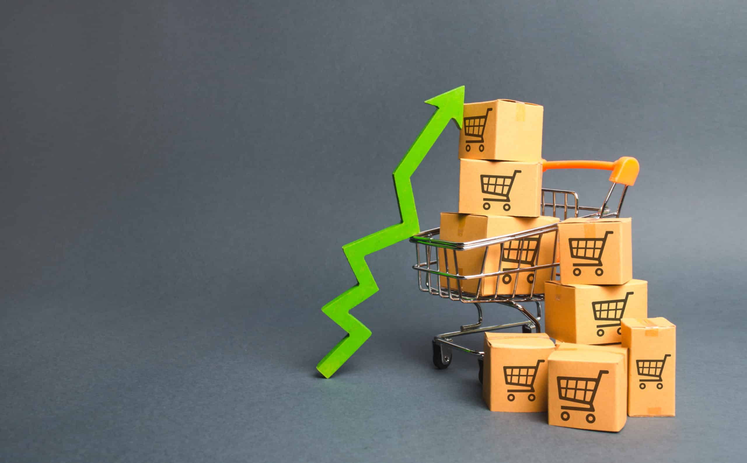 shopping-cart-with-cardboard-boxes-with-pattern-trading-carts-green-up-arrow-scaled