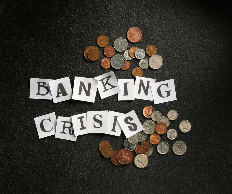 banking crisis letters on a black background with us coins scattered